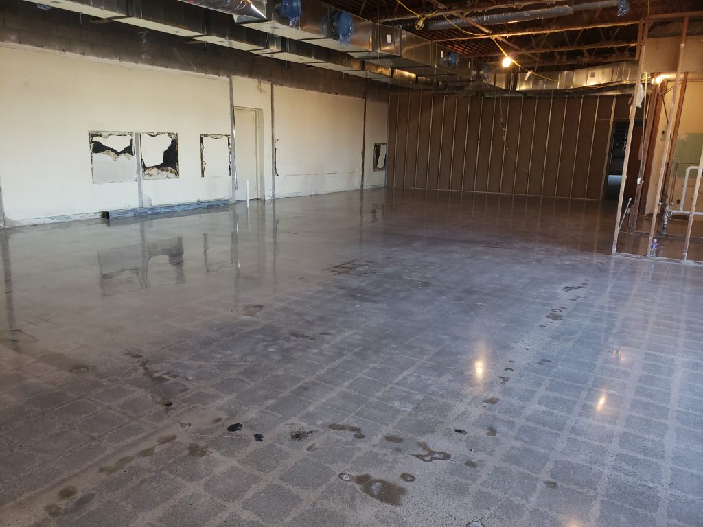 Clark and Erik purchase a new building for DAI with an attached rentable building and form CES Properties One LLC.